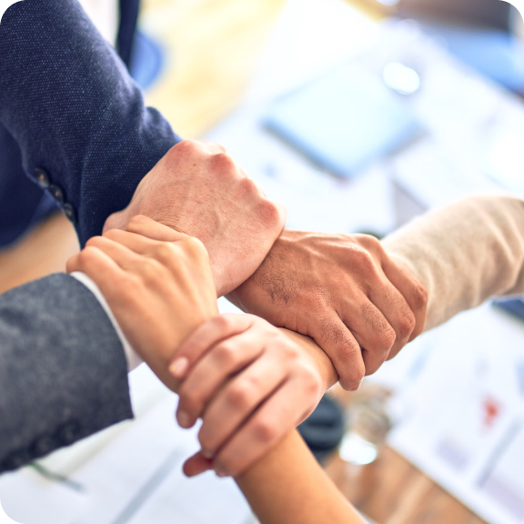Hands joined together in partnership